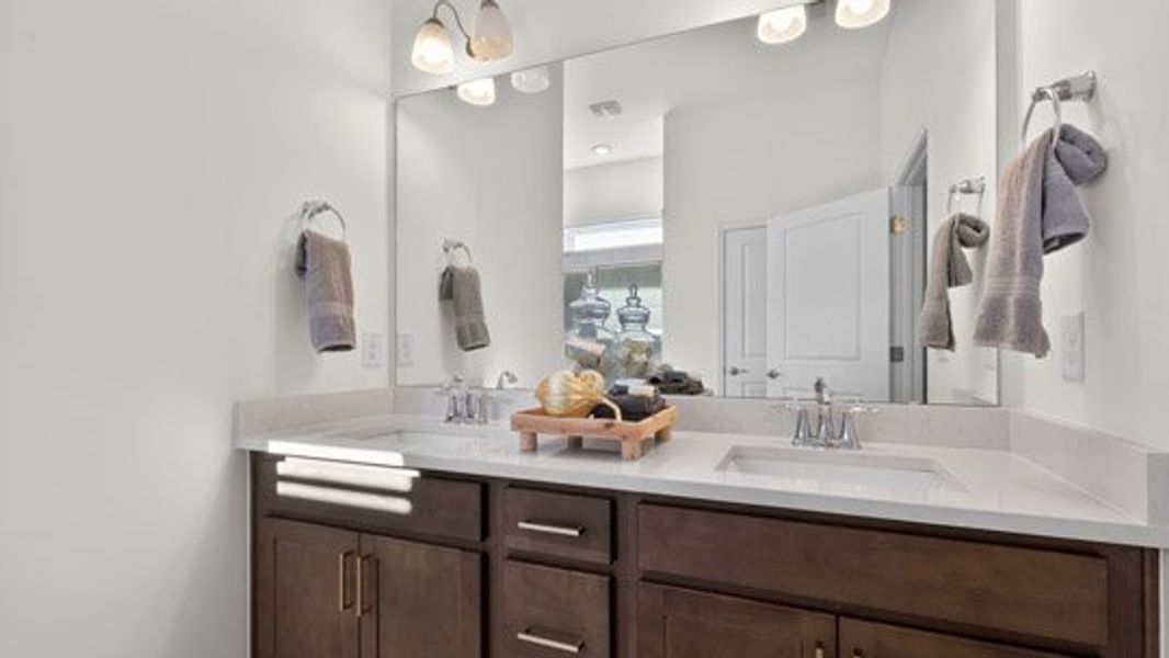 Representative furnished interior of a home built from the Azalea by D.R. Horton in The Villas at Galvins Ridge, Sanford (Image 13).