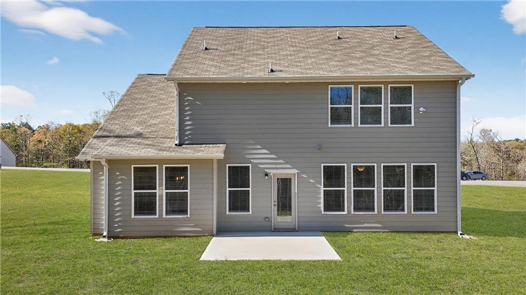 Exterior details and patio area of a home in Waters Edge, Mansfield (Image 4).