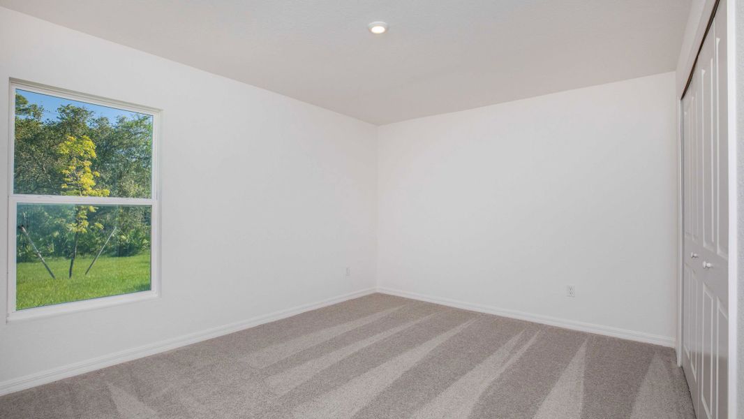 Spacious, unfurnished interior of a new home in Port Charlotte, Port Charlotte (Image 32).