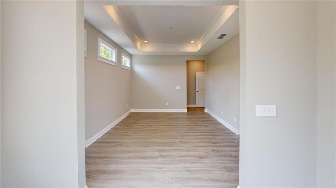 Spacious, unfurnished interior of a new home in The Courtyards at Redbud Lane, Holly Springs (Image 24).