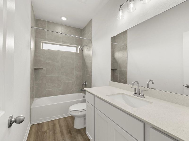 Furnished interior view inside a new home in Crosswinds, Kyle (Image 6).