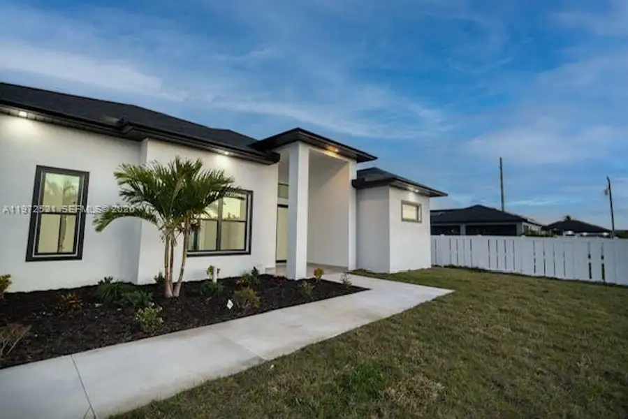 Exterior details and patio area of a home in , Cape Coral (Image 4).