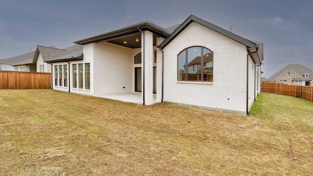 Exterior details and patio area of a home in Terraces, Rockwall (Image 3). Exterior details and patio area of a home in Terraces, Rockwall (Image 3).