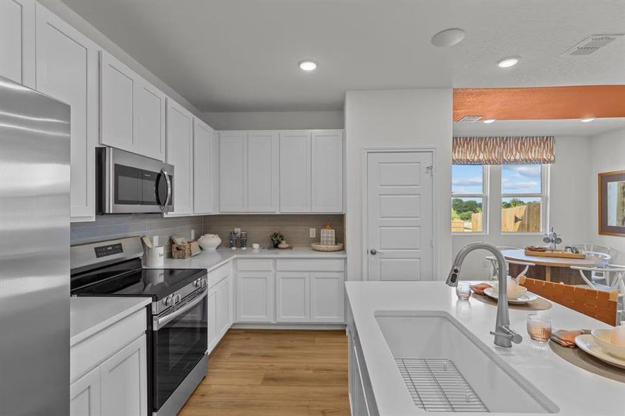 Furnished interior view inside a new home in Hannah Heights, Seguin (Image 6).