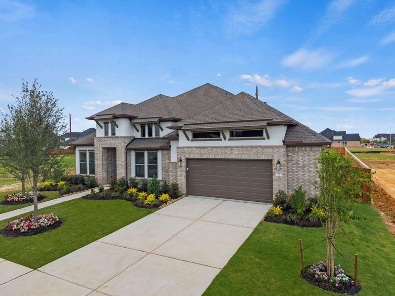 Front exterior of a new home in Dunham Pointe, Cypress, TX, highlighting curb appeal (Image 22). Front exterior of a new home in Dunham Pointe, Cypress, TX, highlighting curb appeal (Image 22).