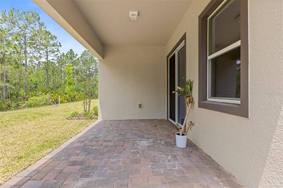 Exterior details and patio area of a home in Gray Hawk at Hole Two, Daytona Beach (Image 26).