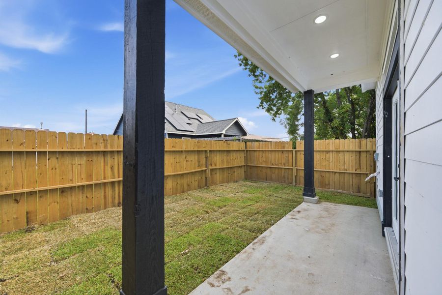 Backyard with covered patio Backyard with covered patio