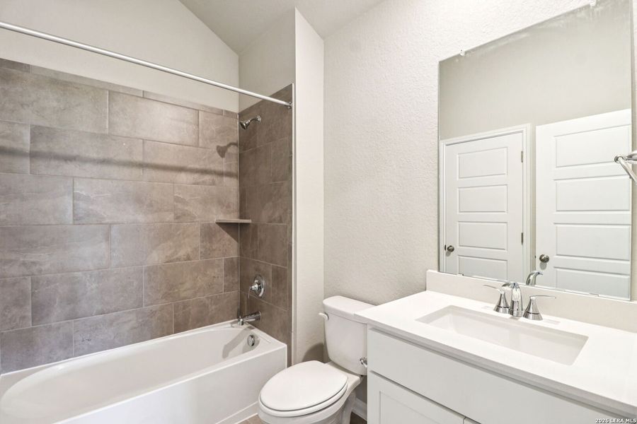 Furnished interior view inside a new home in Estancia Ranch - Classic Series, San Antonio (Image 11).