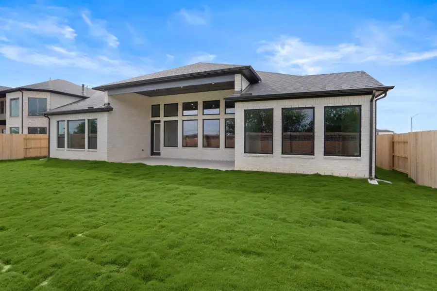 Expansive covered back patio perfect for entertaining Expansive covered back patio perfect for entertaining
