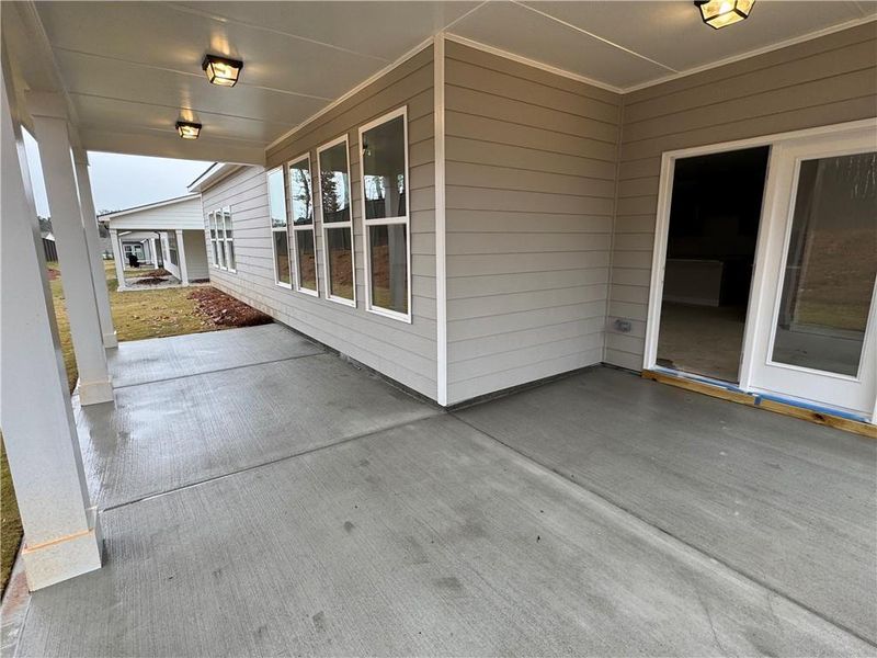 Exterior details and patio area of a home in Rosewood Lake Preserve, Hoschton (Image 12).