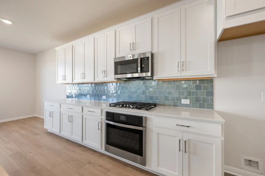 Furnished interior view inside a new home in Cannon Ranch, Dripping Springs (Image 10).