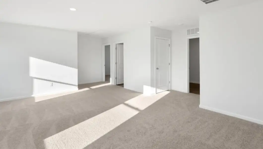 Representative unfurnished interior of a home built from the Robie by D.R. Horton in Saunders Village, Northwest (Image 20).