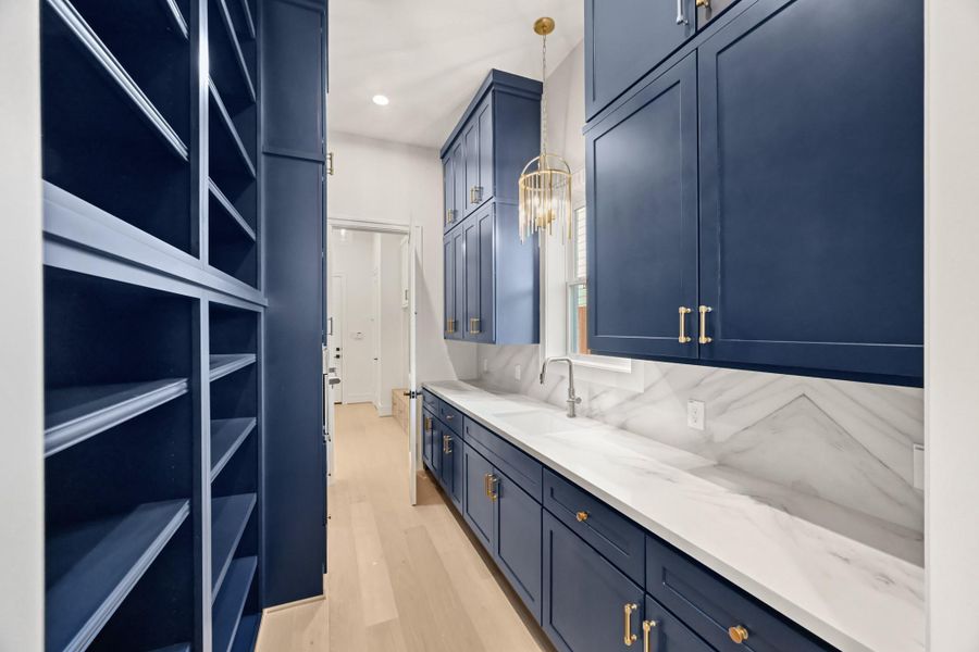 Just behind the kitchen is this incredible working pantry!