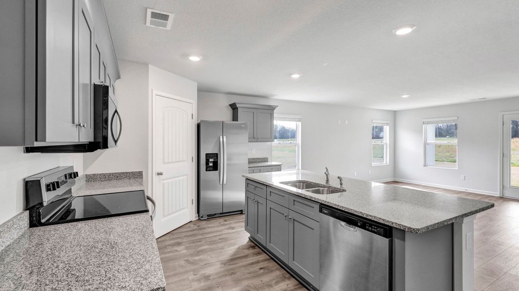Furnished interior view inside a new home in Huntington Estates, Millington (Image 7).