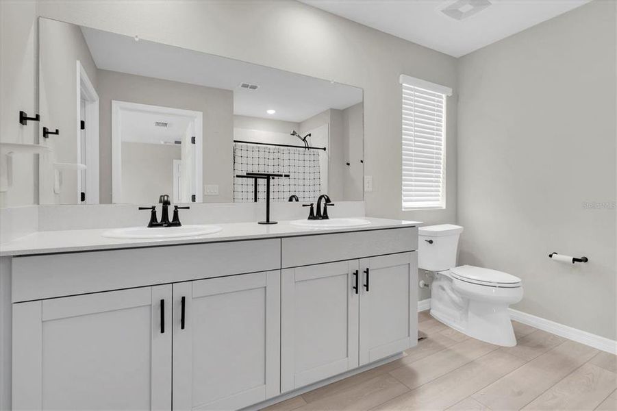 Furnished interior view inside a new home in Crosswind Point, Parrish (Image 12).