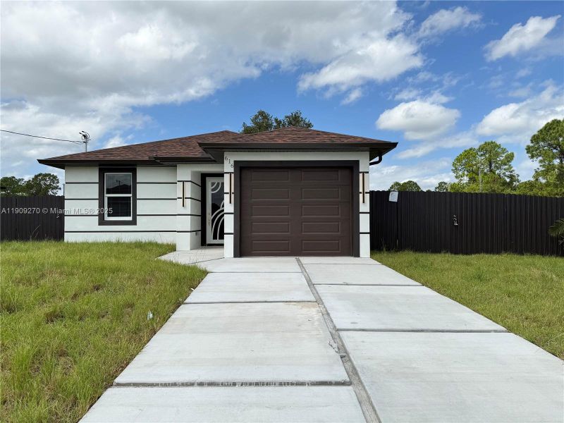 Exterior details and patio area of a home in , Lehigh Acres (Image 19). Exterior details and patio area of a home in , Lehigh Acres (Image 19).