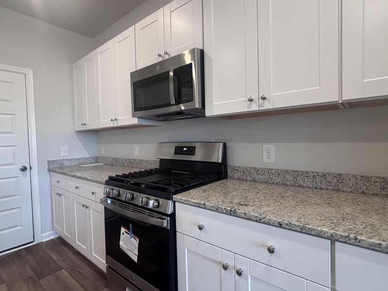 Furnished interior view inside a new home in Lindera Preserve at Cane Bay Plantation: Townhomes, Summerville (Image 6). Furnished interior view inside a new home in Lindera Preserve at Cane Bay Plantation: Townhomes, Summerville (Image 6).
