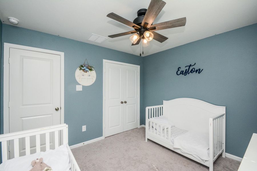 Furnished interior view inside a new home in Granger Pines, Conroe (Image 26).
