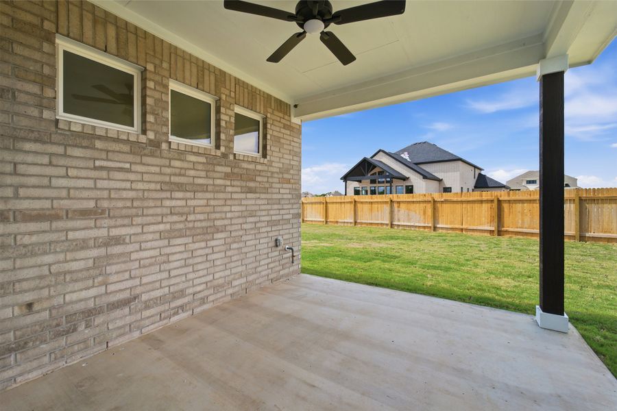 Exterior details and patio area of a home in Santa Rita Ranch, Liberty Hill (Image 28). Exterior details and patio area of a home in Santa Rita Ranch, Liberty Hill (Image 28).