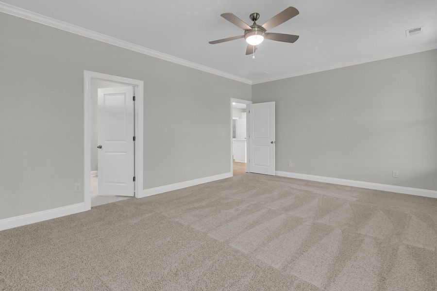 Spacious, unfurnished interior of a new home in Tidewater at Lakes of Cane Bay, Summerville (Image 27).