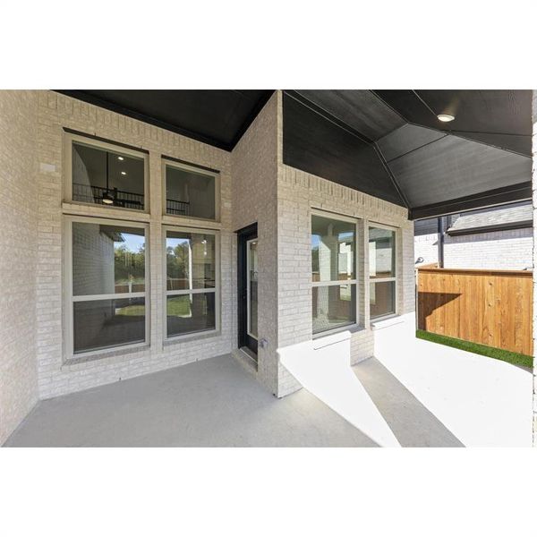 Front exterior of a new home in Trails at Cottonwood Creek, Rowlett, TX, highlighting curb appeal (Image 23).