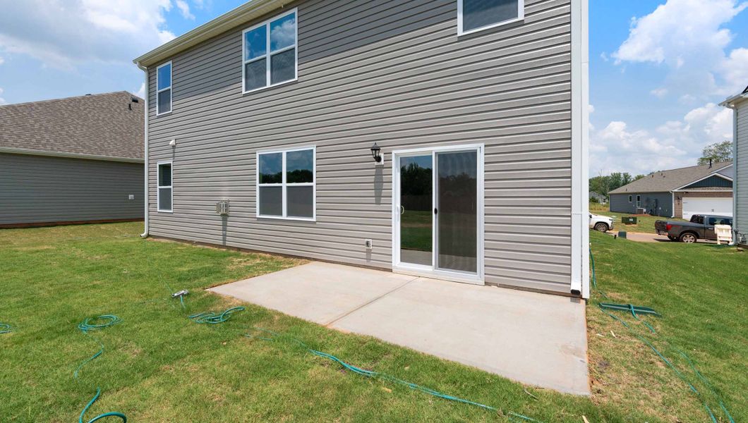 Exterior details and patio area of a home in Benjamin's Grove, Woodruff (Image 3).