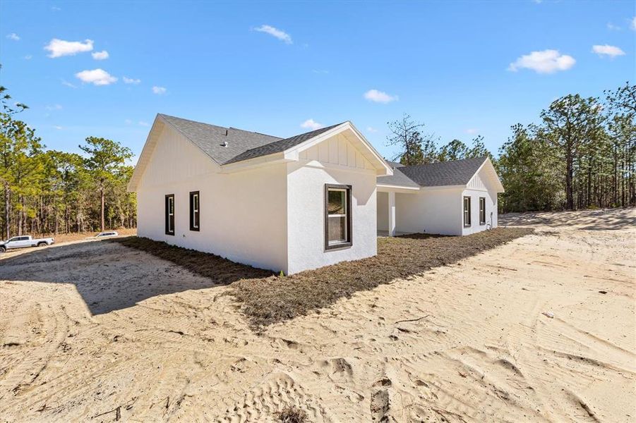 Exterior details and patio area of a home in , Wildwood (Image 24).