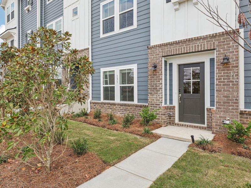Exterior details and patio area of a home in Meadows at Wilson Farms - The Heights Series, Fort Mill (Image 1). Exterior details and patio area of a home in Meadows at Wilson Farms - The Heights Series, Fort Mill (Image 1).