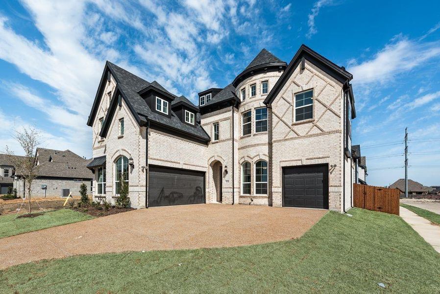 Front exterior of a new home in Cedar Ridge Estates, Grand Prairie, TX, highlighting curb appeal (Image 2). Front exterior of a new home in Cedar Ridge Estates, Grand Prairie, TX, highlighting curb appeal (Image 2).