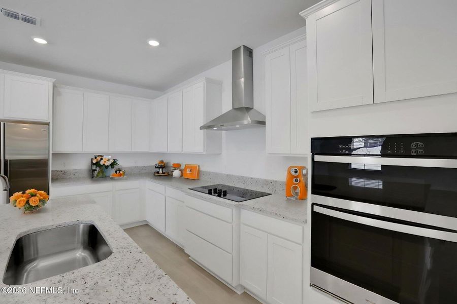 Furnished interior view inside a new home in Amberly, Green Cove Springs (Image 11).