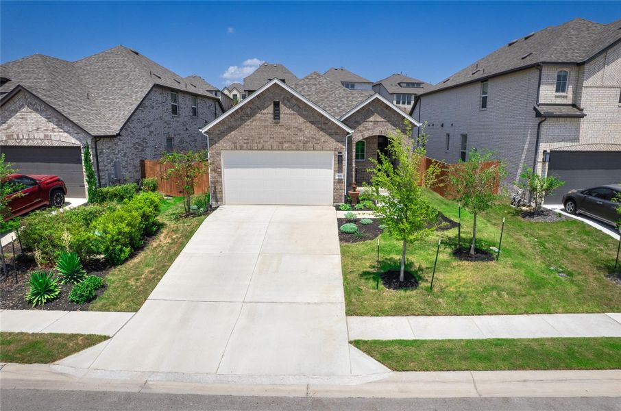 Front exterior of a new home in , Lago Vista, TX, highlighting curb appeal (Image 19). Front exterior of a new home in , Lago Vista, TX, highlighting curb appeal (Image 19).