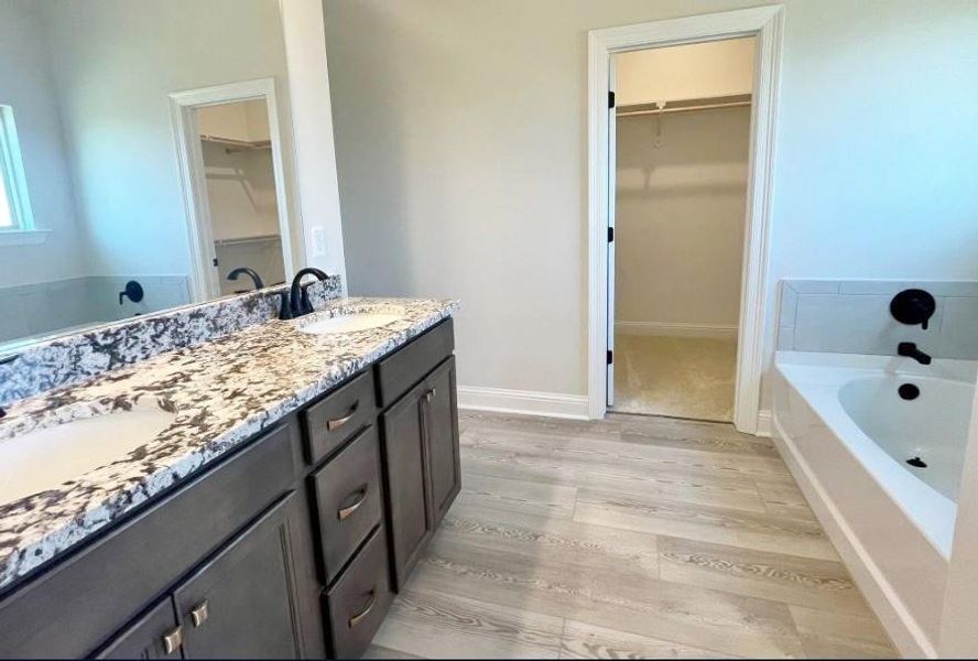 Furnished interior view inside a new home in Orange Gardens, Orange (Image 6).