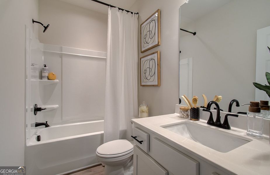 Furnished interior view inside a new home in Rosewood Lake Estates, Hoschton (Image 59).