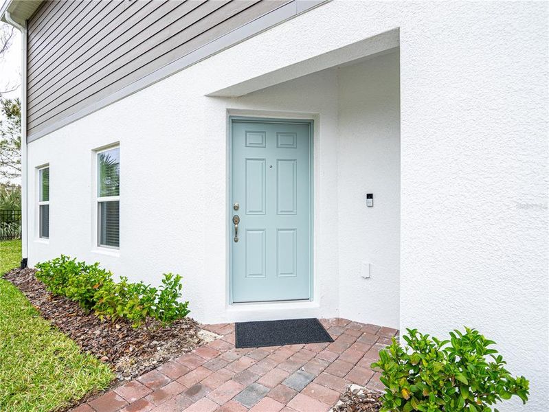 Exterior details and patio area of a home in Towns at Tuskawilla Commons, Oviedo (Image 4).