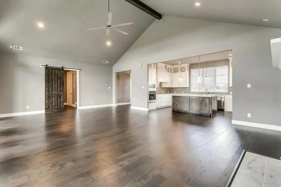 Representative unfurnished interior of a home built from the The Carter by Elmwood Custom Homes in Ranch at Stone Hill, Waxahachie (Image 35).