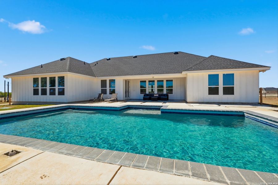 Exterior details and patio area of a home in , Floresville (Image 20).