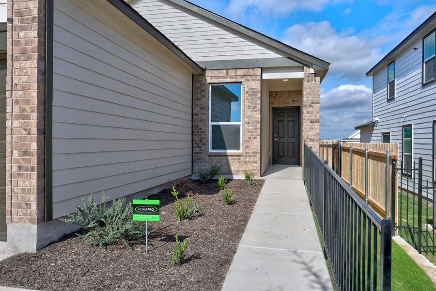 Exterior details and patio area of a home in Creekside at Estancia, Austin (Image 3).
