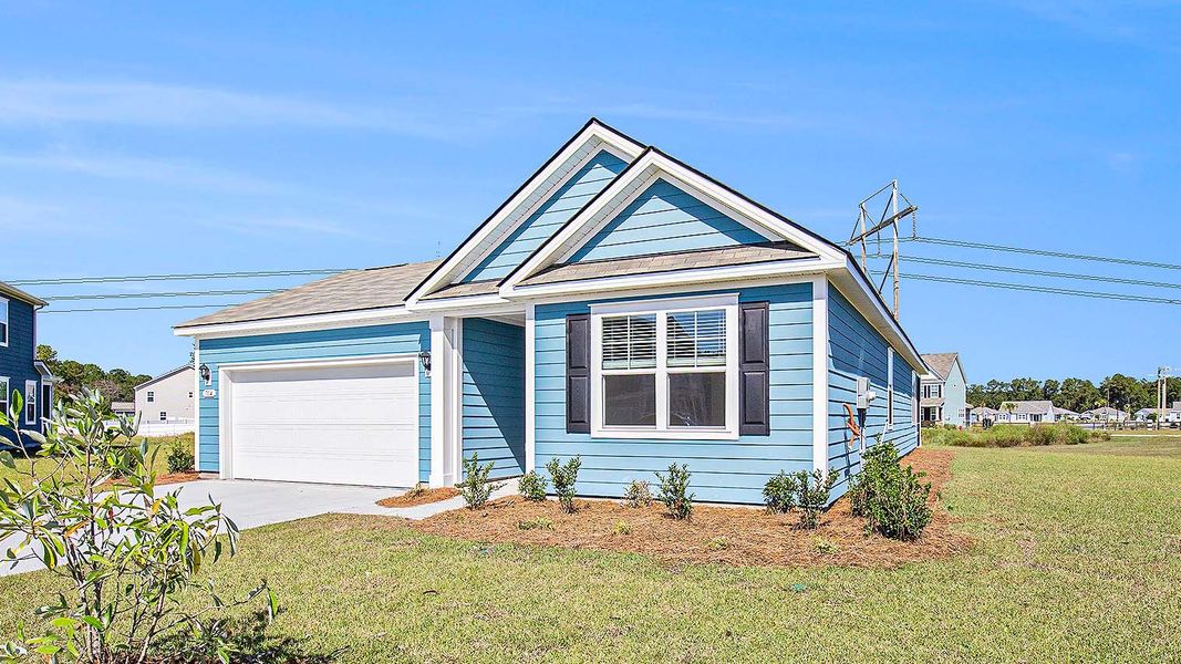 Front exterior of a new home in Lochaven, Conway, SC, highlighting curb appeal (Image 2). Front exterior of a new home in Lochaven, Conway, SC, highlighting curb appeal (Image 2).