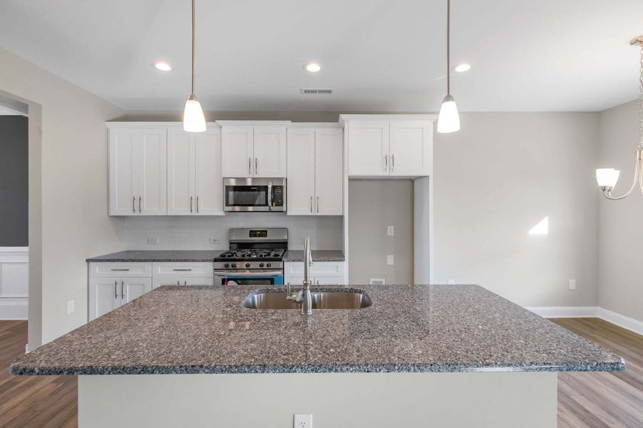 Representative furnished interior of a home built from the Clayton by Caviness & Cates Communities in Bartlett Manor, Youngsville (Image 168).