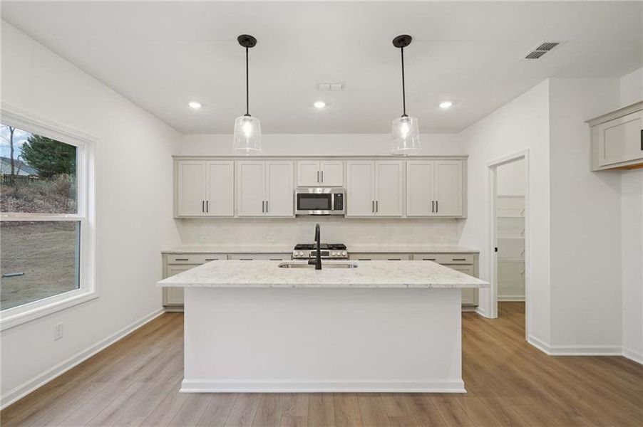 Furnished interior view inside a new home in Eastlyn Crossing, Flowery Branch (Image 6). Furnished interior view inside a new home in Eastlyn Crossing, Flowery Branch (Image 6).