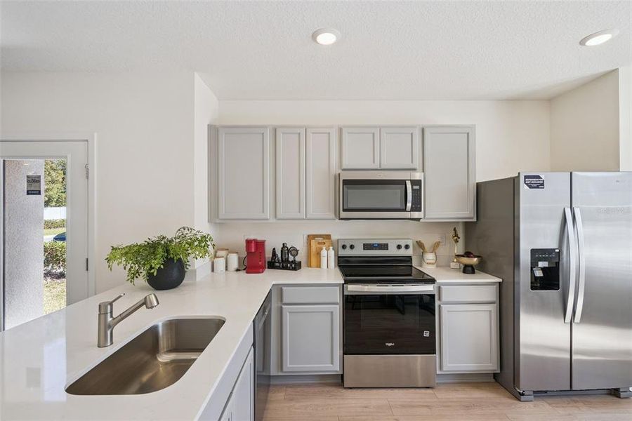 Furnished interior view inside a new home in Oak Pointe, Apopka (Image 15).