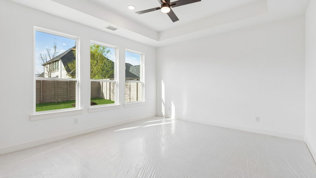 Representative unfurnished interior of a home built from the Chapelle III by Normandy Homes in Rainwater Crossing, Celina (Image 17).