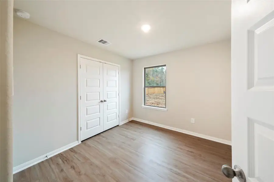 Spacious, unfurnished interior of a new home in Lexington Heights, Willis (Image 19). Spacious, unfurnished interior of a new home in Lexington Heights, Willis (Image 19).