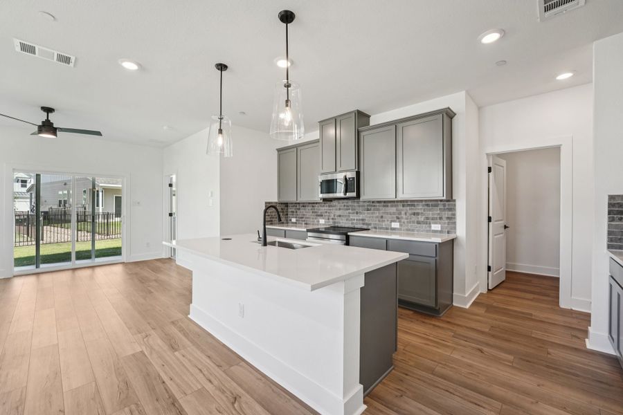 Furnished interior view inside a new home in Avery Centre, Round Rock (Image 4).