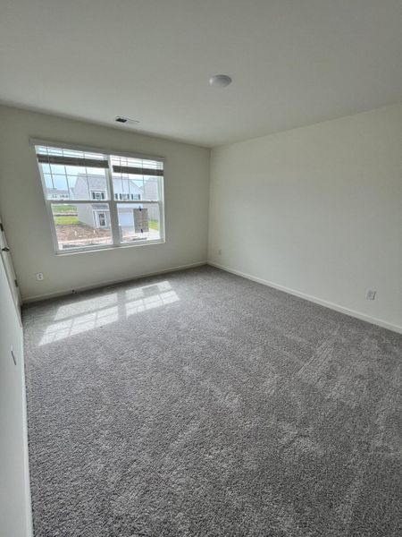 Spacious, unfurnished interior of a new home in Crossing at Givhans, Ridgeville (Image 7).