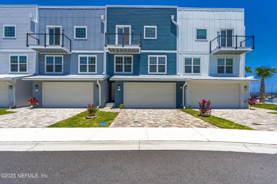 Front exterior of a new home in , St. Augustine, FL, highlighting curb appeal (Image 24).