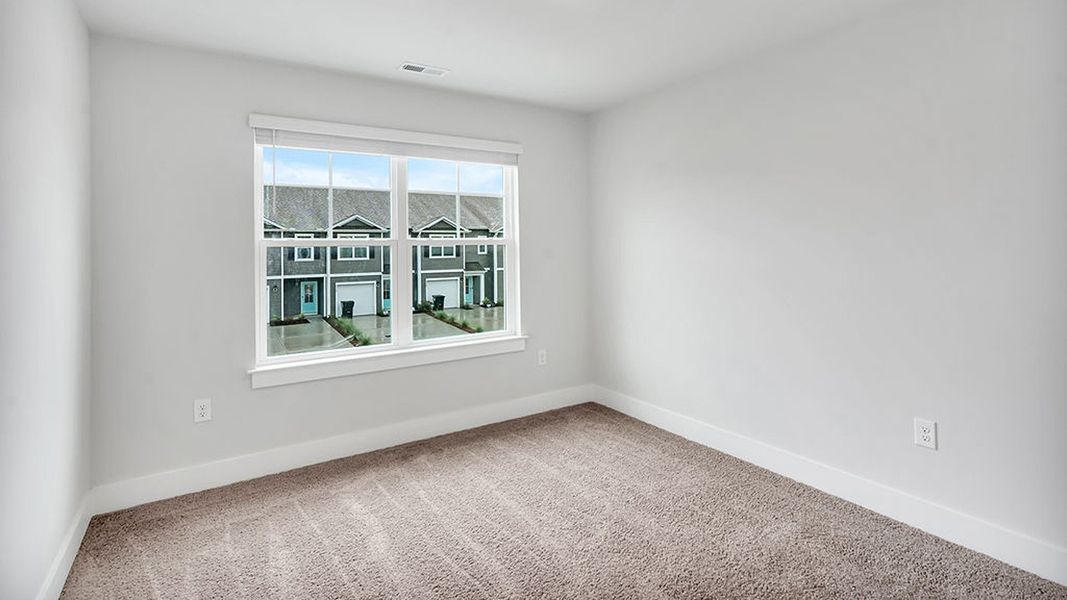 Spacious, unfurnished interior of a new home in The Landing at Sidbury Station, Castle Hayne (Image 28).
