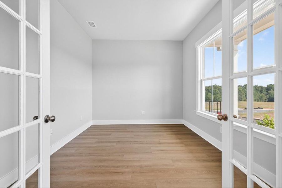 Spacious, unfurnished interior of a new home in Traditions of Braselton, Hoschton (Image 20).