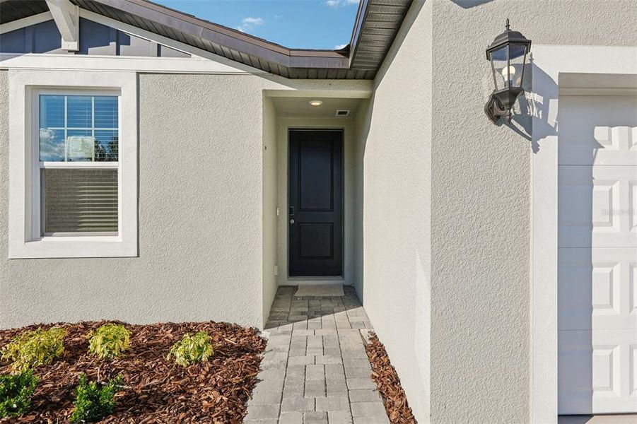 Exterior details and patio area of a home in Wynnstone - Signature Series, Davenport (Image 3).