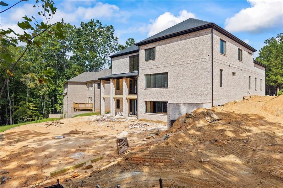 Front exterior of a new home in , Fairburn, GA, highlighting curb appeal (Image 26).